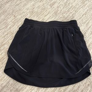 Lululemon hottie hot skirt in black. New without tags. Size 6.